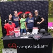 Picture of people behind a vendor booth