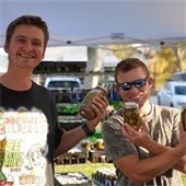 Picture of two men selling pickles
